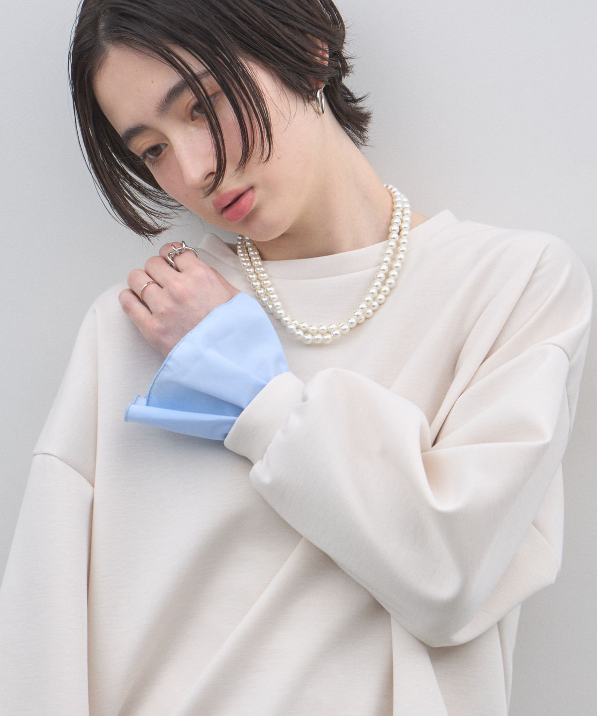 オフィシャルサイト限定】フリルヘムレイヤード風スウェット